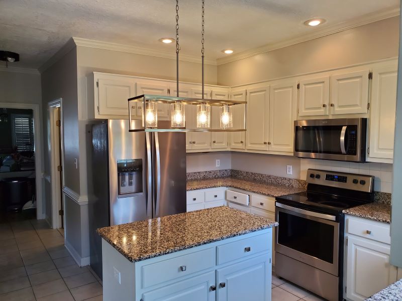 kitchen after renovation of Custom Fixture, Cabinets, and countertops view 2